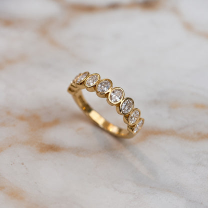 Oval bezel set half band - 0.80ct+