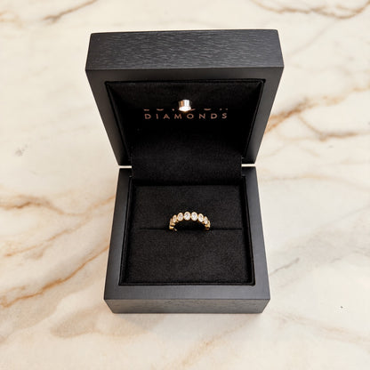 Oval bezel set half band - 0.80ct+