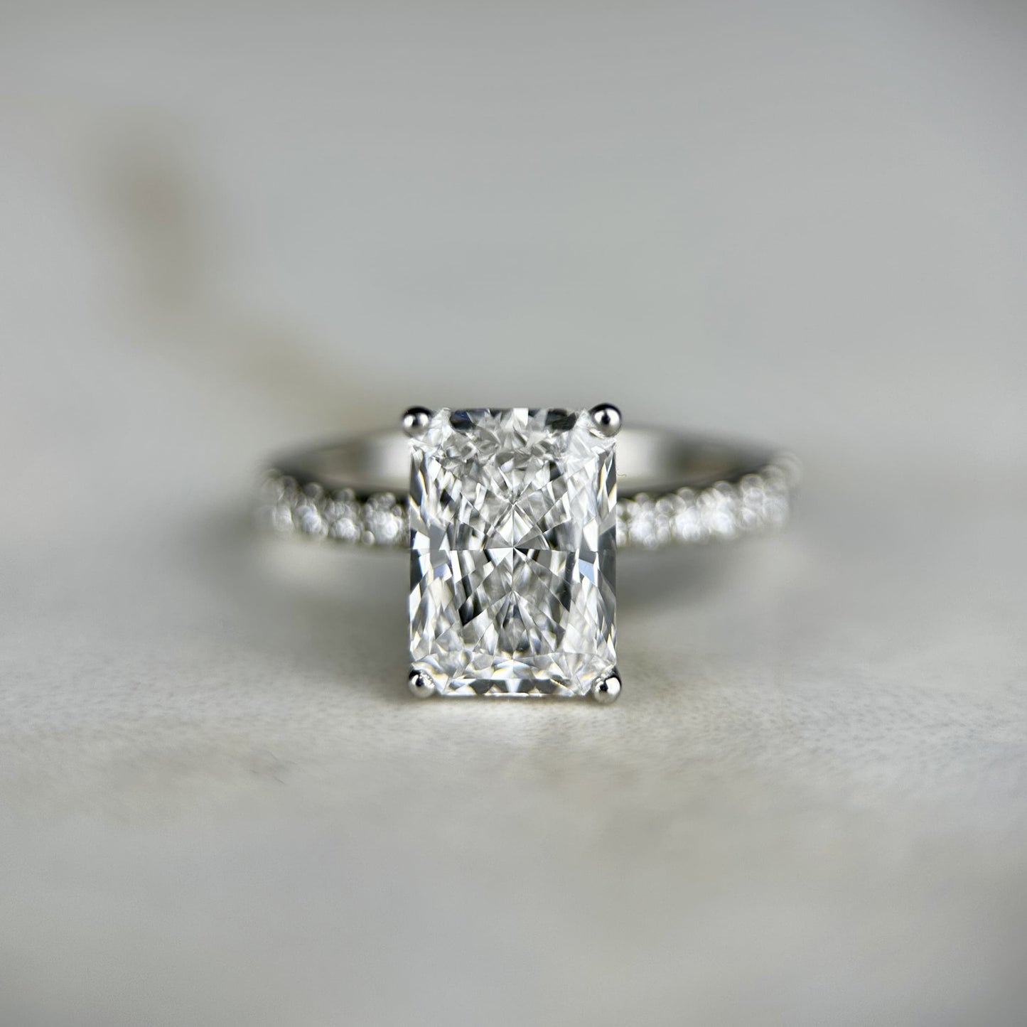 Classic Radiant Cut Hidden Halo with Diamond Band - 2ct+ (9mm+, D/E & VVS)