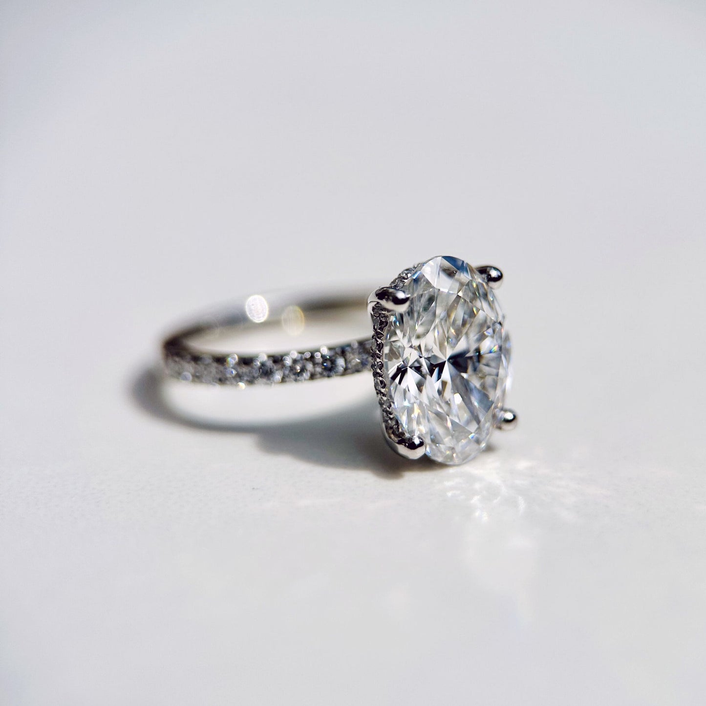 Classic Oval Cut Hidden Halo with Diamond Band - 3ct+ (11.5mm+, D/E & VVS)