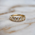 Oval bezel set half band - 0.80ct+
