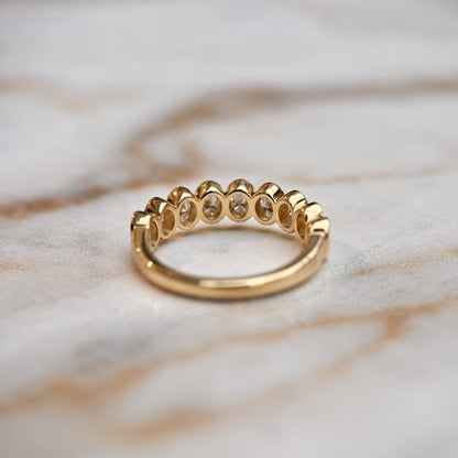 Oval bezel set half band - 0.80ct+