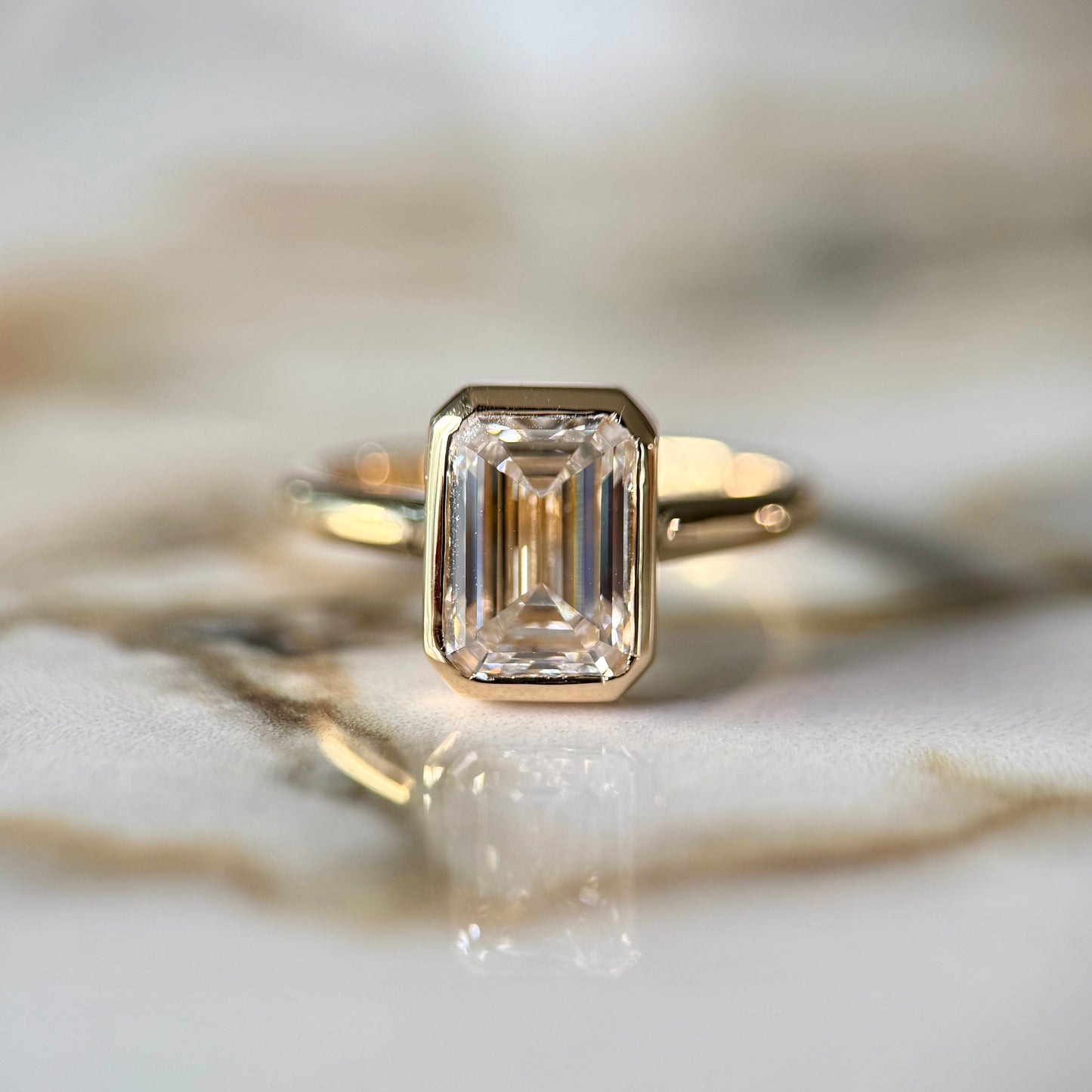 London Diamonds Bezel Set Classic Emerald Cut Solitaire - 2ct+ (10mm+, D/E & VVS)