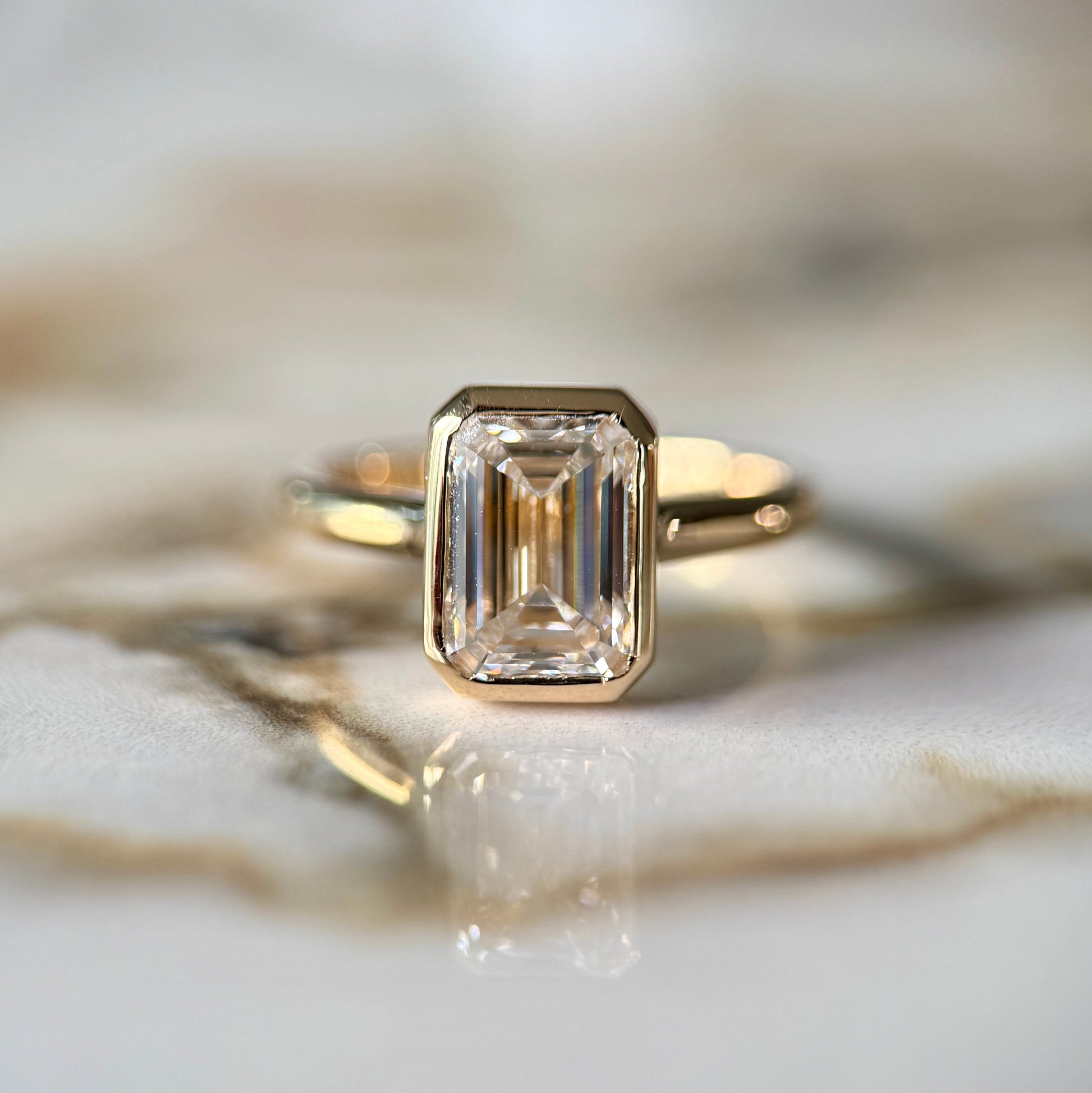 London Diamonds Bezel Set Classic Emerald Cut Solitaire - 2ct+ (10mm+, D/E & VVS)