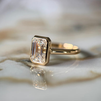 London Diamonds Bezel Set Classic Emerald Cut Solitaire - 2ct+ (10mm+, D/E & VVS)