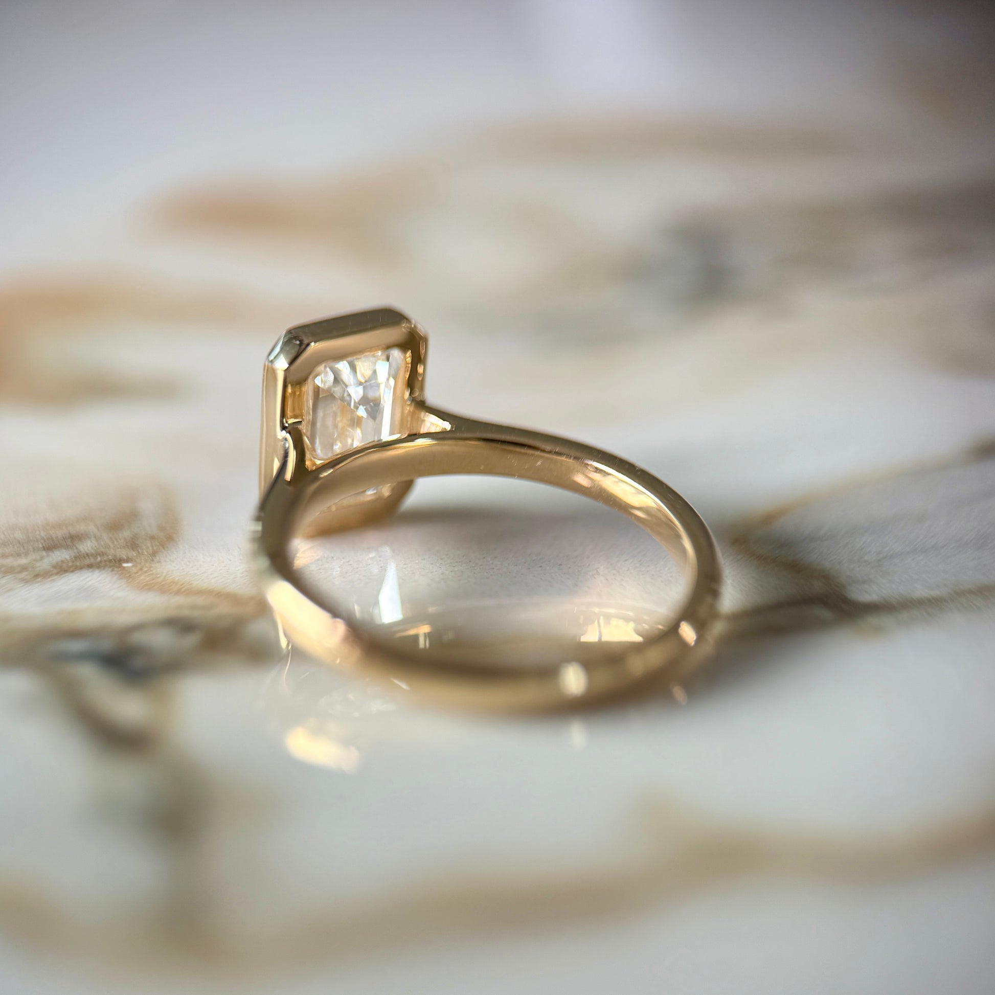 London Diamonds Bezel Set Classic Emerald Cut Solitaire - 2ct+ (10mm+, D/E & VVS)