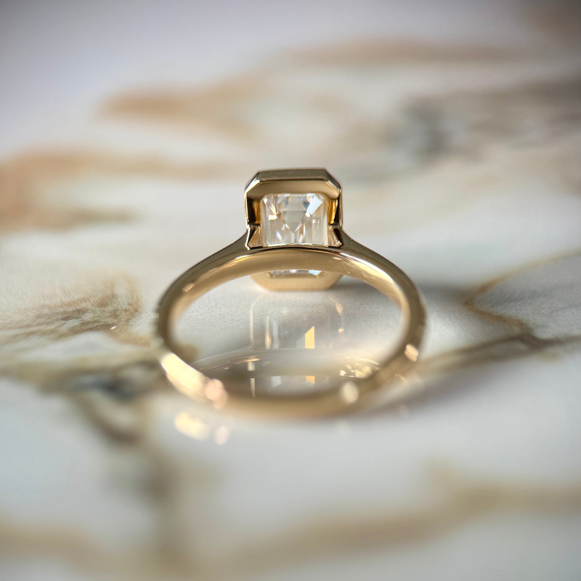 London Diamonds Bezel Set Classic Emerald Cut Solitaire - 2ct+ (10mm+, D/E & VVS)