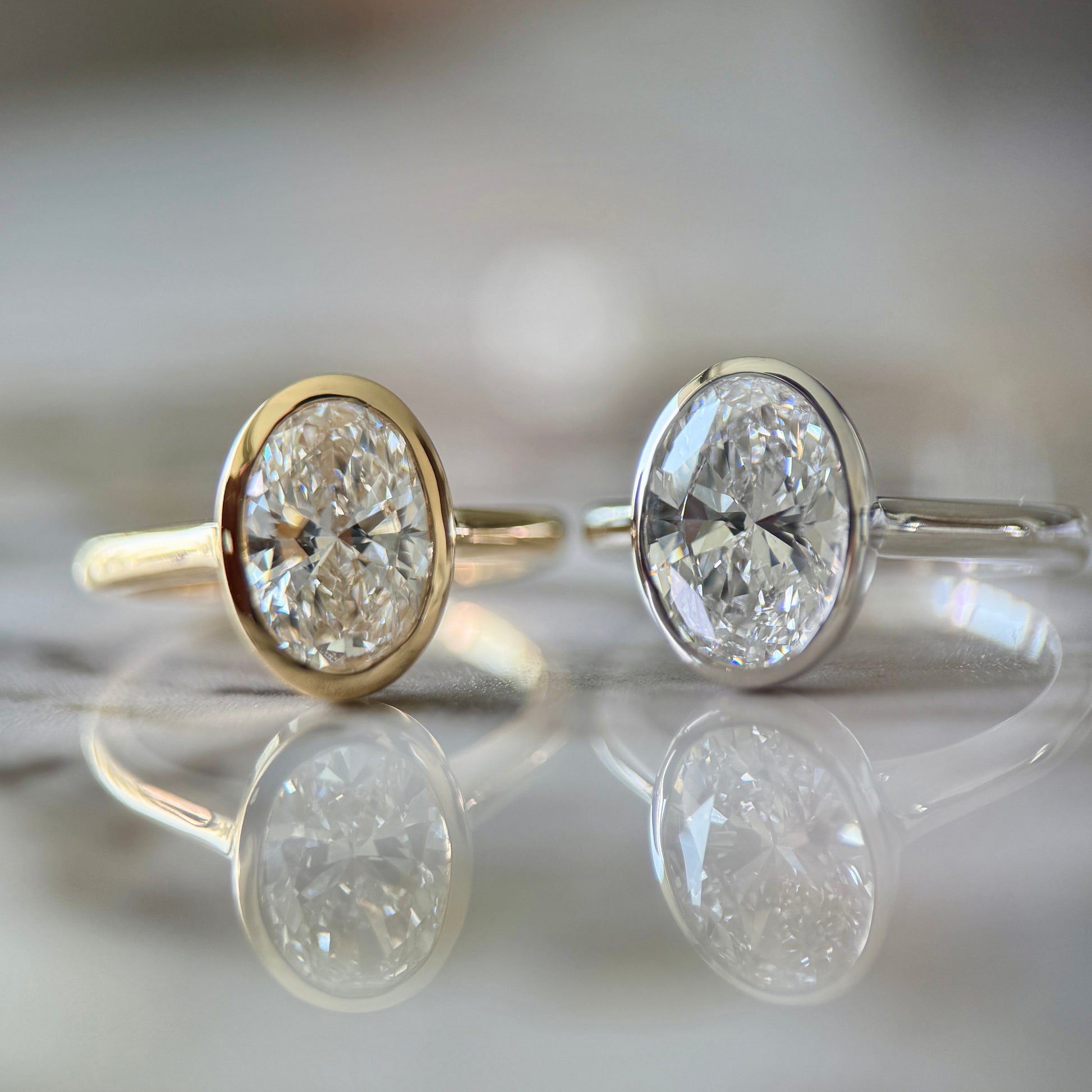 London Diamonds Bezel Set Classic Oval Cut Solitaire - 2ct+ (10mm+, D/E & VVS)