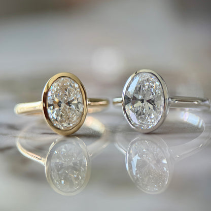 London Diamonds Bezel Set Classic Oval Cut Solitaire - 2ct+ (10mm+, D/E & VVS)