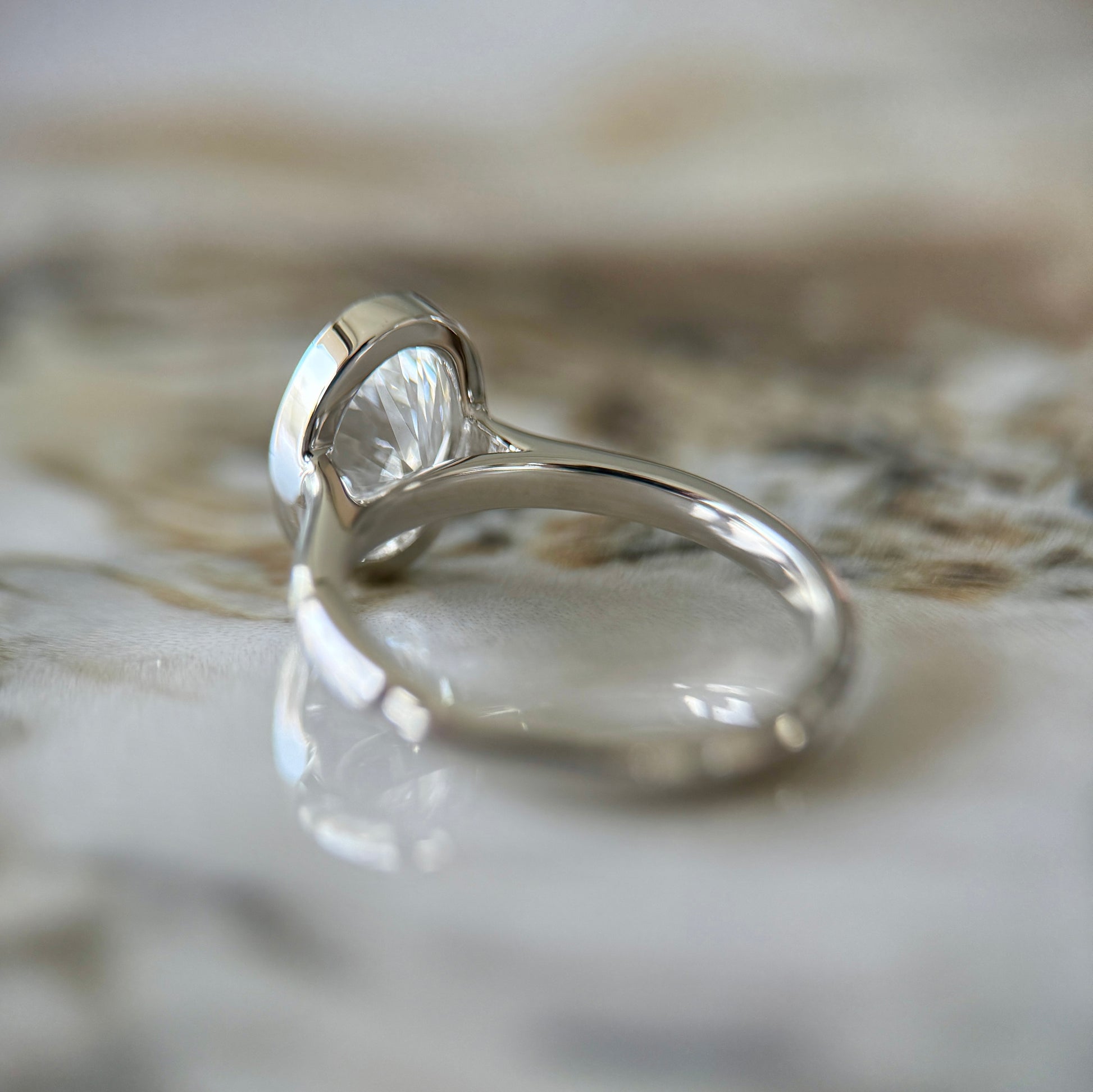 London Diamonds Bezel Set Classic Oval Cut Solitaire - 2ct+ (10mm+, D/E & VVS)