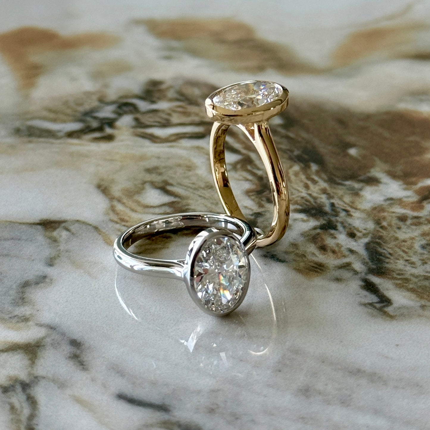 London Diamonds Bezel Set Classic Oval Cut Solitaire - 2ct+ (10mm+, D/E & VVS)