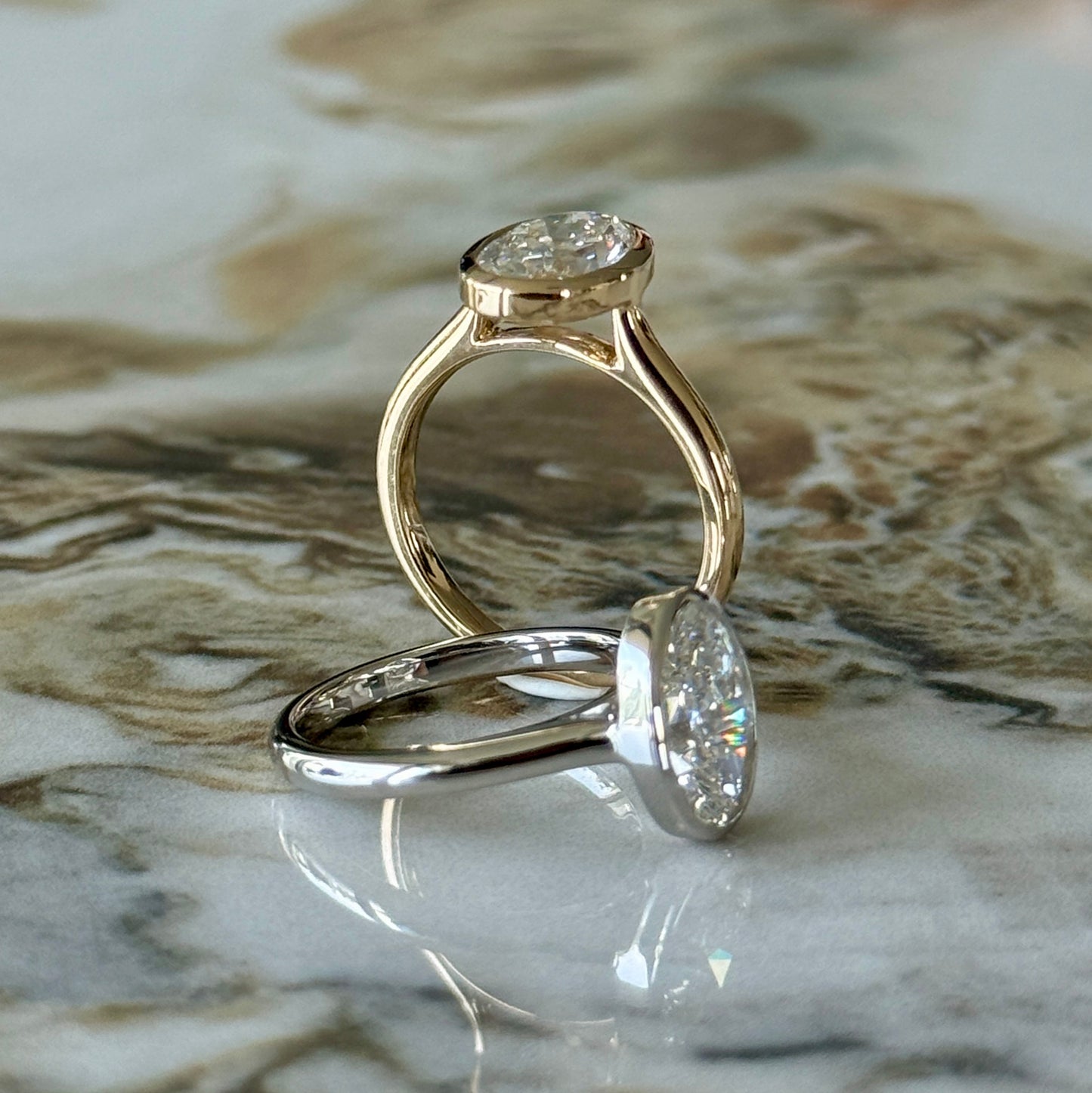 London Diamonds Bezel Set Classic Oval Cut Solitaire - 2ct+ (10mm+, D/E & VVS)
