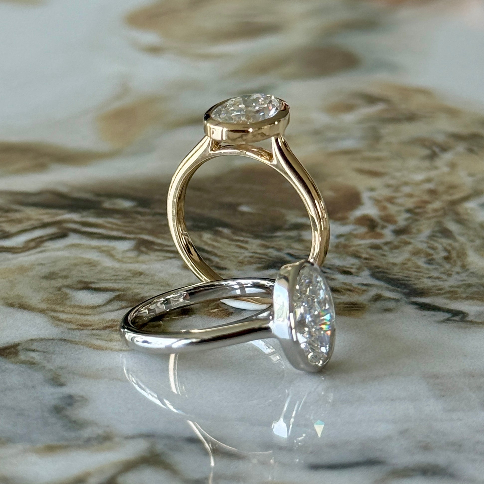 London Diamonds Bezel Set Classic Oval Cut Solitaire - 2ct+ (10mm+, D/E & VVS)