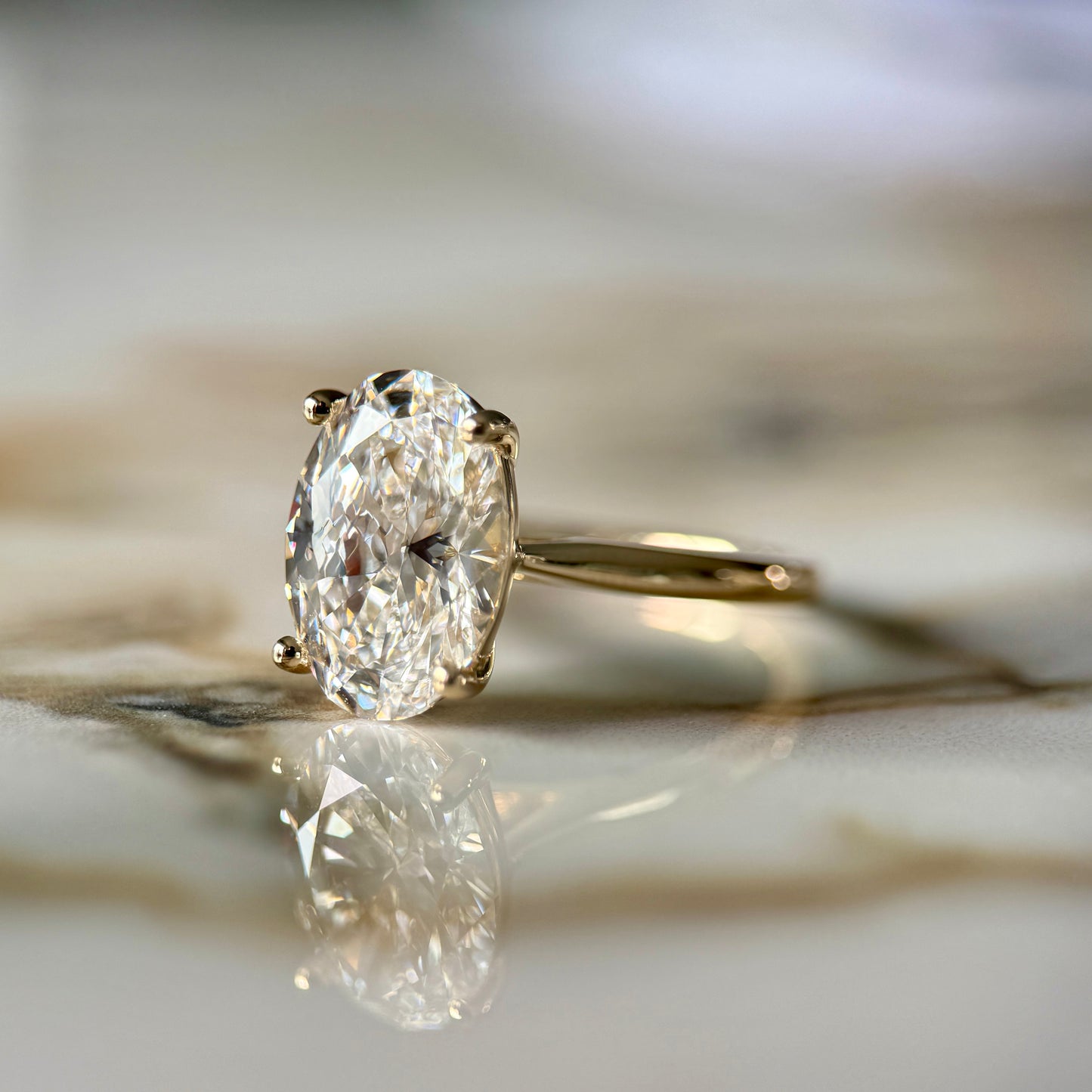 London Diamonds Cathedral Set Classic Oval Cut Solitaire - 3ct+ (11.5mm+, D/E & VVS)