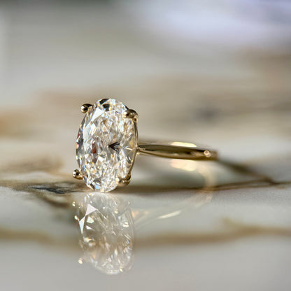 London Diamonds Cathedral Set Classic Oval Cut Solitaire - 3ct+ (11.5mm+, D/E & VVS)