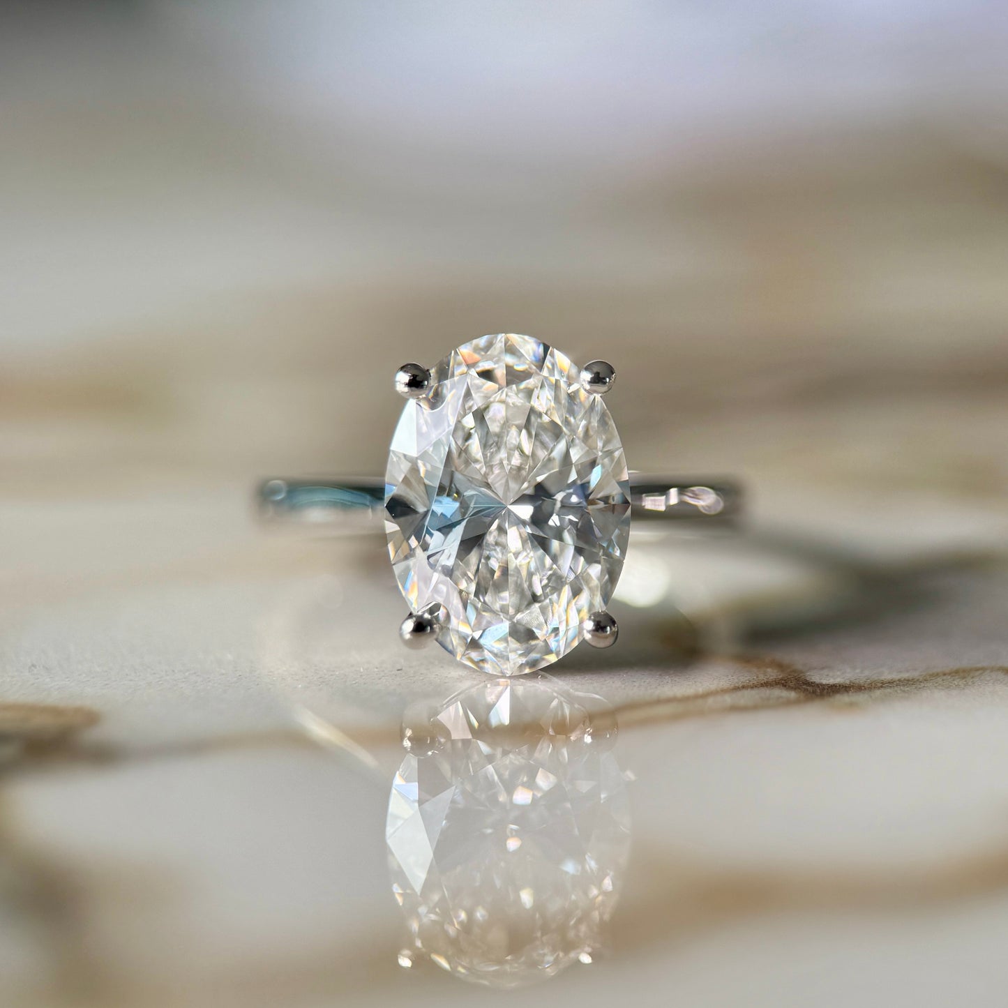 London Diamonds Cathedral Set Classic Oval Cut Solitaire - 3ct+ (11.5mm+, D/E & VVS)