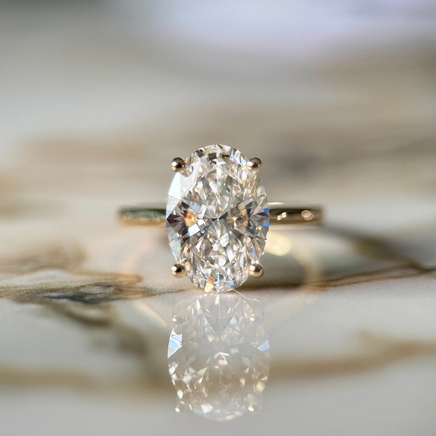 London Diamonds Cathedral Set Classic Oval Cut Solitaire - 3ct+ (11.5mm+, D/E & VVS)