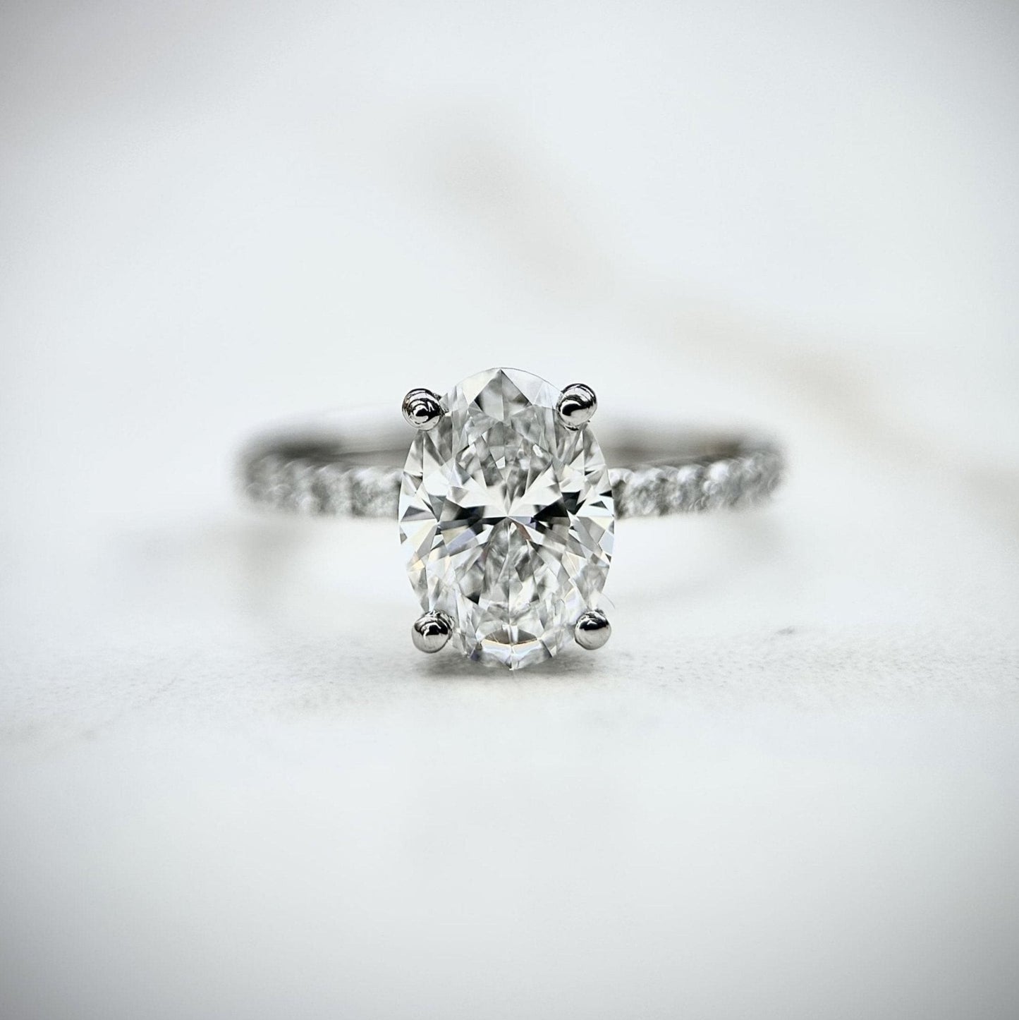 Classic Oval Cut Hidden Halo with Diamond Band - 1.80ct+ (9.5mm+, D/E & VVS)