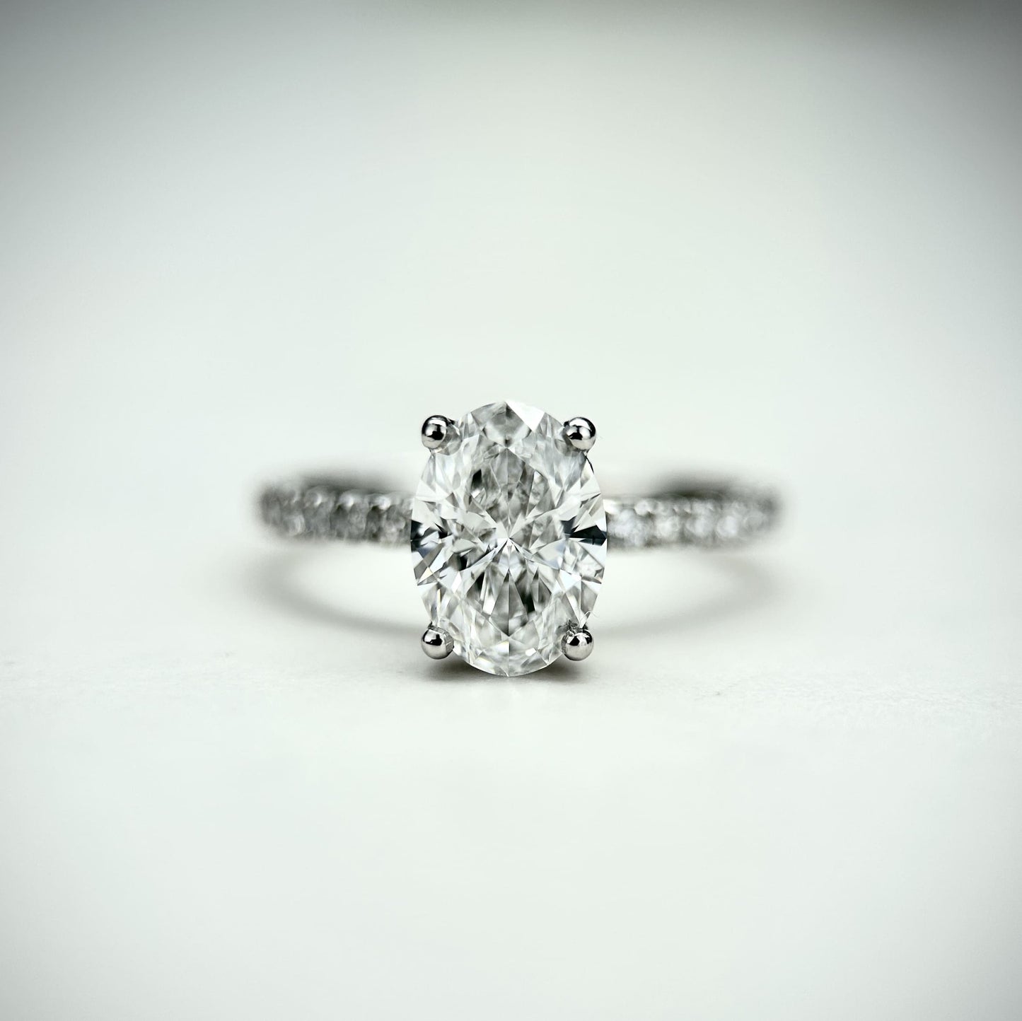 Classic Oval Cut Hidden Halo with Diamond Band - 1.20ct+ (8.5mm+, D/E & VVS)