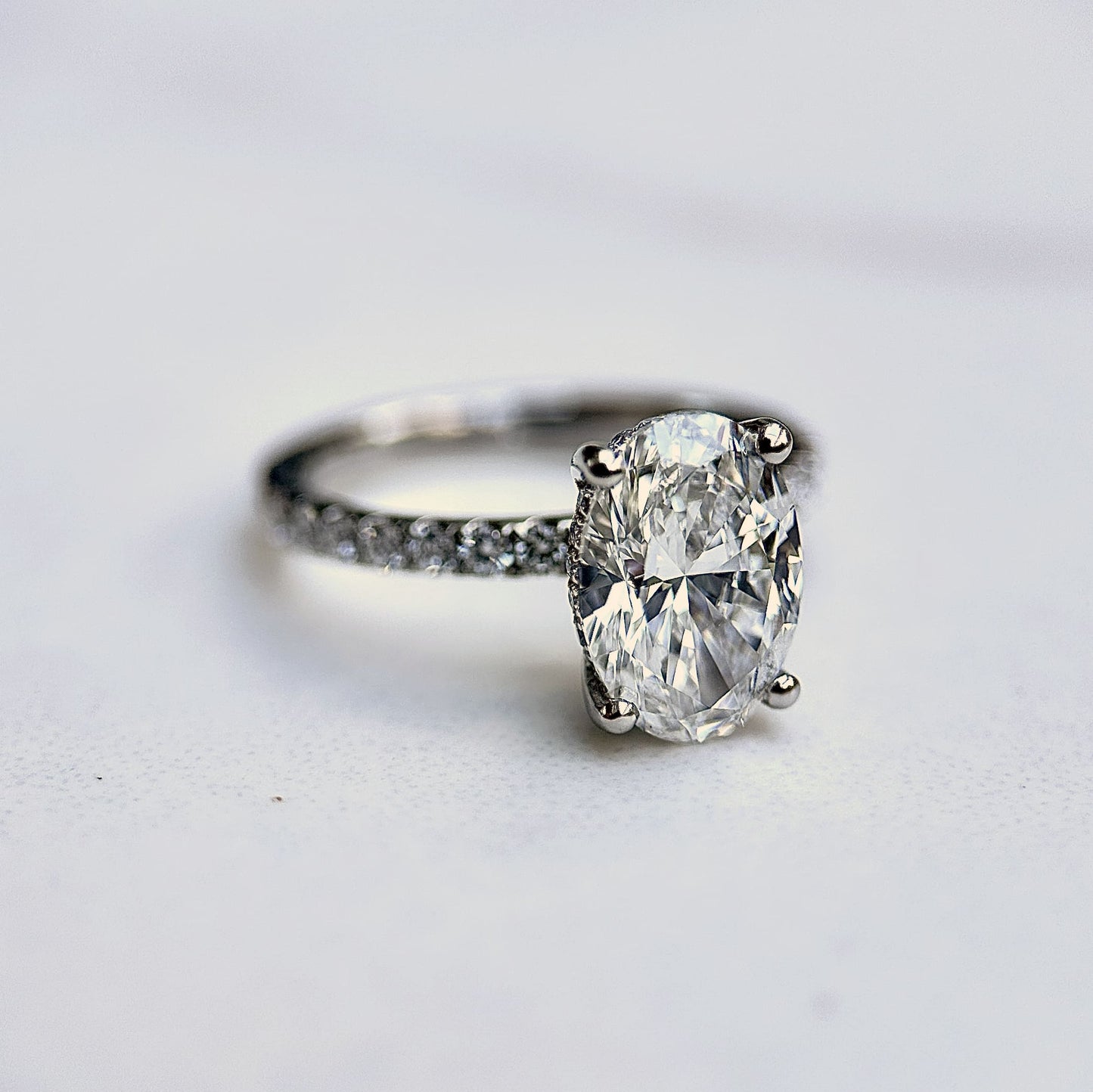 Classic Oval Cut Hidden Halo with Diamond Band - 2ct+ (10mm+, D/E & VVS)