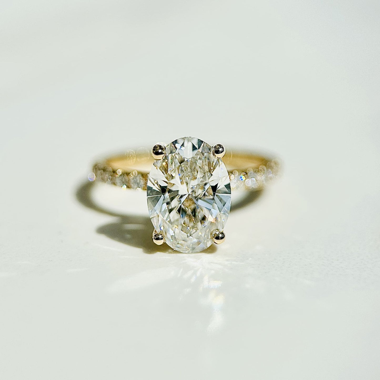 Classic Oval Cut Hidden Halo with Diamond Band - 2ct+ (10mm+, D/E & VVS)