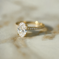 Classic Oval Cut Solitaire with Diamond Band - 1ct+ (8mm+, D/E & VVS)
