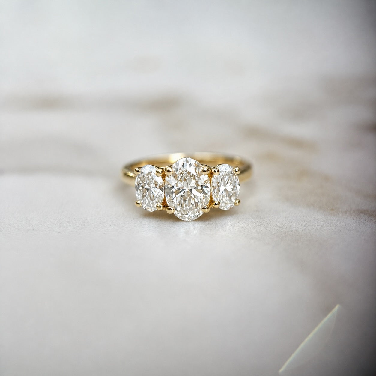Classic Oval Trilogy - 2ct+ (D/E & VVS main diamond)