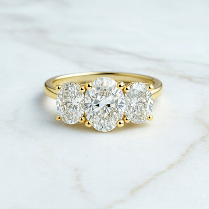Classic Oval Trilogy - 3ct+ (D/E & VVS main diamond)