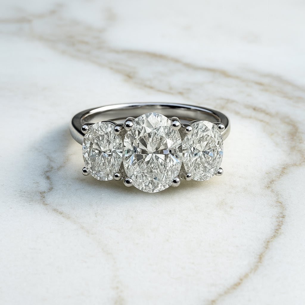 Classic Oval Trilogy - 3ct+ (D/E & VVS main diamond)