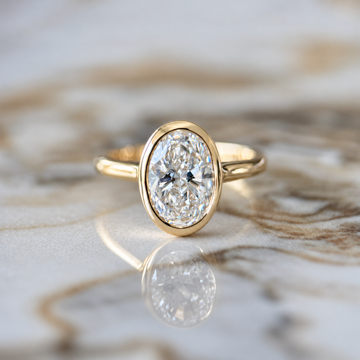 Bezel Set Classic Oval Cut Solitaire - 2ct+ (10mm+, D/E & VVS)