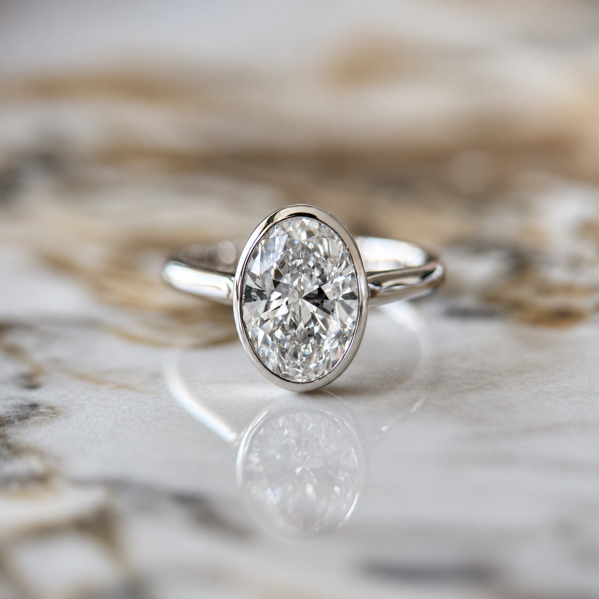 Bezel Set Classic Oval Cut Solitaire - 2ct+ (10mm+, D/E & VVS)