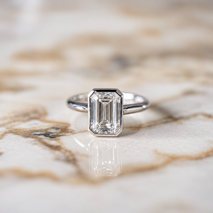 Bezel Set Classic Emerald Cut Solitaire - 2ct+ (D/E & VVS)