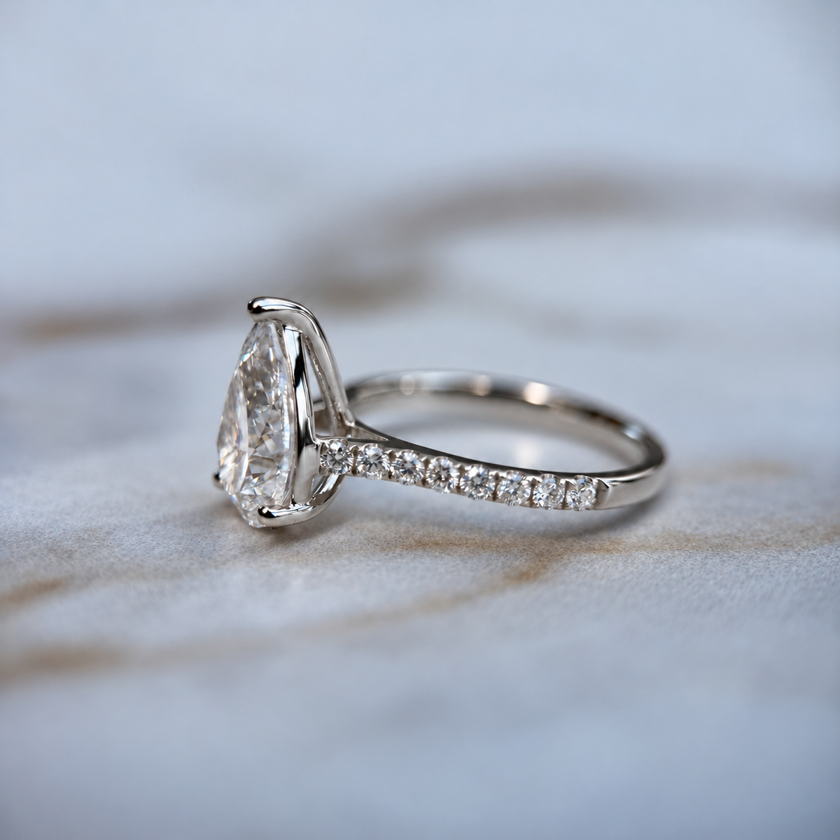 Classic Pear Cut Solitaire with Diamond Band - 2ct+ (D/E & VVS)
